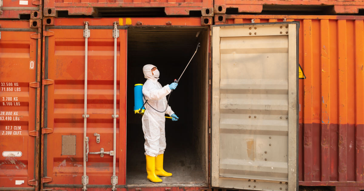 Inspector looking at cargo container before packing with electronic components; are you concerned about mitigating supply chain risk? Take a look at Sourcengine's e-commerce marketplace for help.