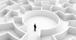 Individual stands at the center of a labyrinth; navigating the complexities of the component supply chain will be like a maze in 2021; but Sourcengine's e-commerce marketplace can help.