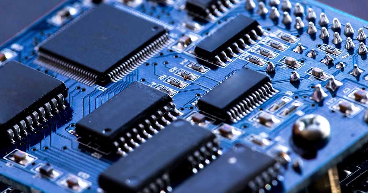 A close up of several small ICs affixed to a circuit board. Sourcengine provides users access to a comprehensive BOM Tool with comparison and quote features.