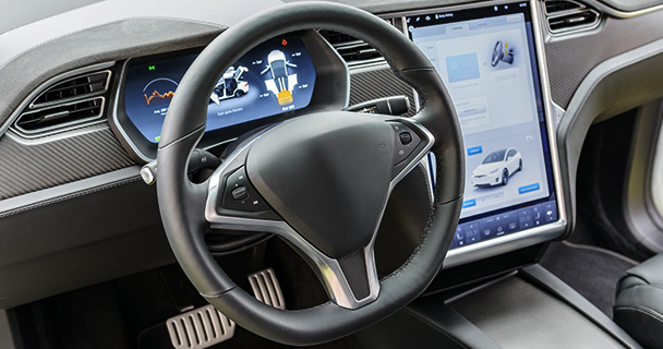 An automobile cockpit, featuring infotainment system and digital instrument panels. | Sourcengine