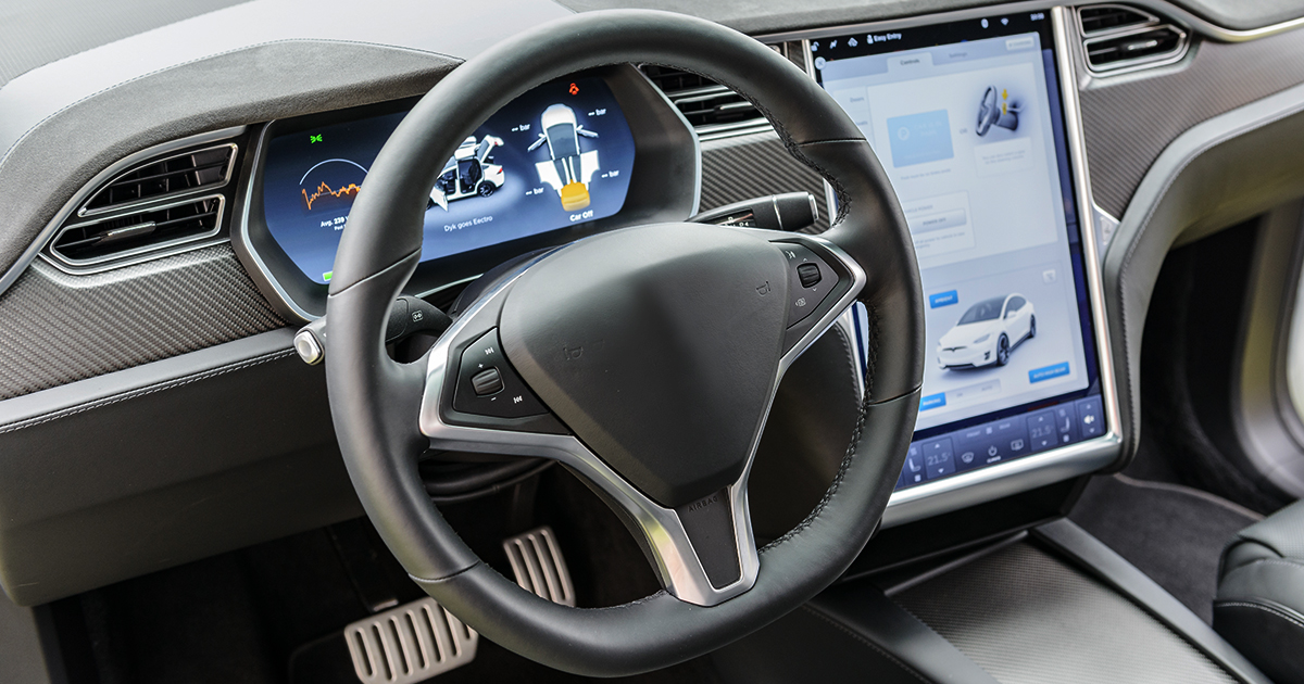 An automobile cockpit, featuring infotainment system and digital instrument panels. | Sourcengine