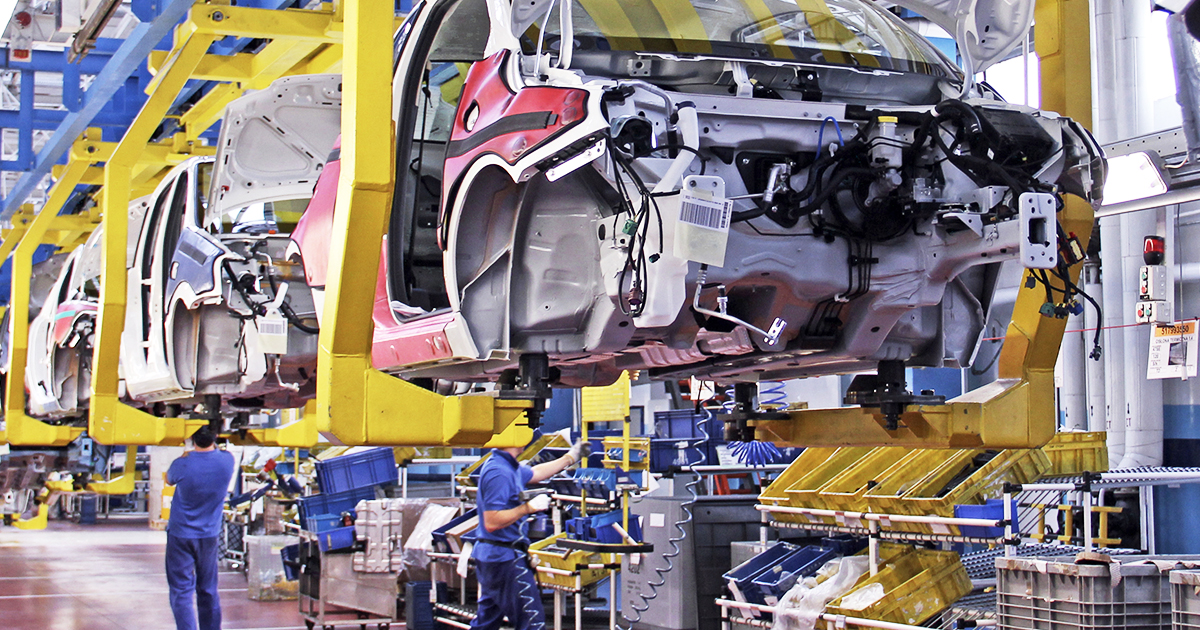 An automobile assembly plant that is in the process of building a car | Sourcengine
