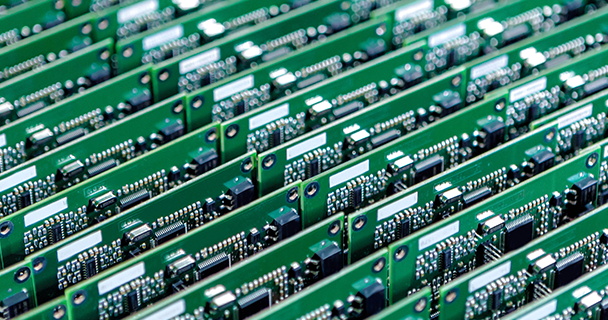 An extreme close-up of a microprocessor that is operating inside a computer system.