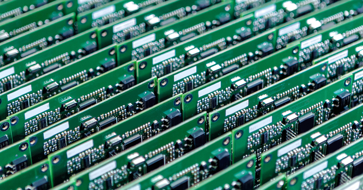 An extreme close-up of a microprocessor that is operating inside a computer system.