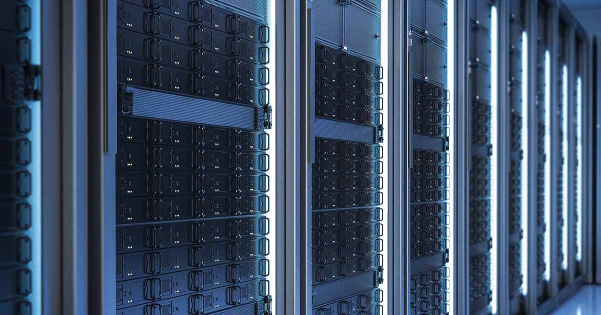 A photograph of eight enterprise server bays inside a data center.