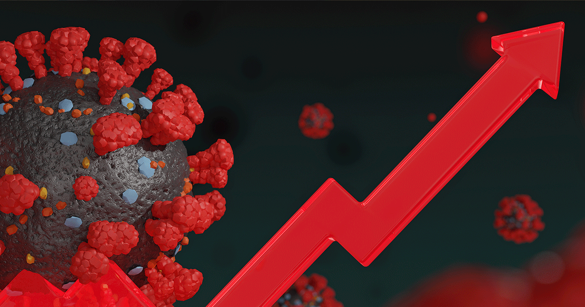 An illustration of the coronavirus next to a chart line indicating an upward spike.