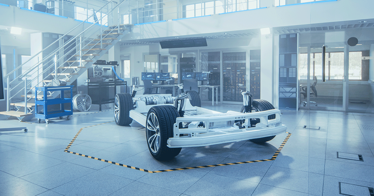The frame of an automobile waiting to be constructed