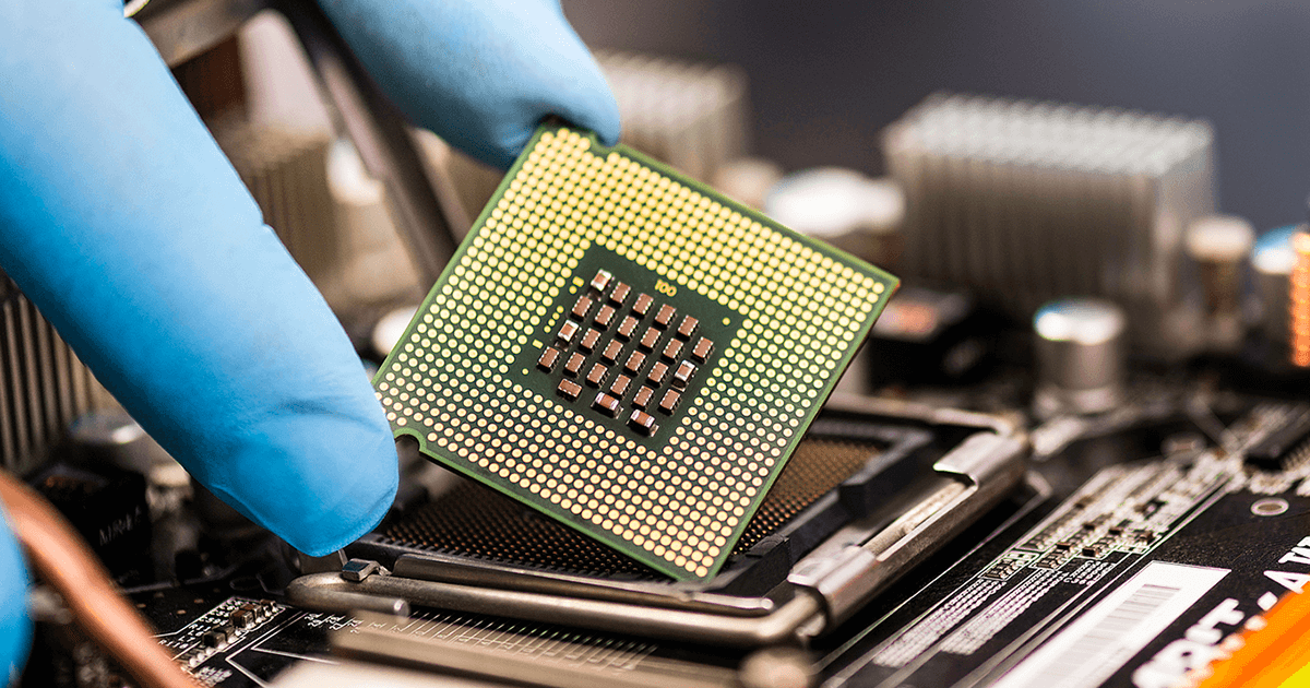 Close up of a chip being held up to the camera