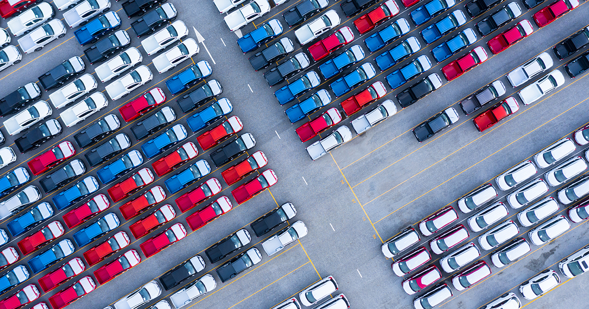 Cars parked on a production lot