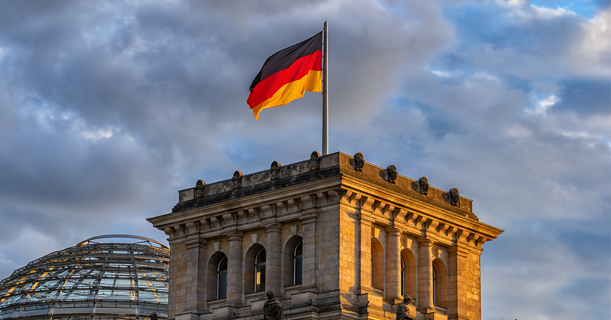The German flag flying over a building