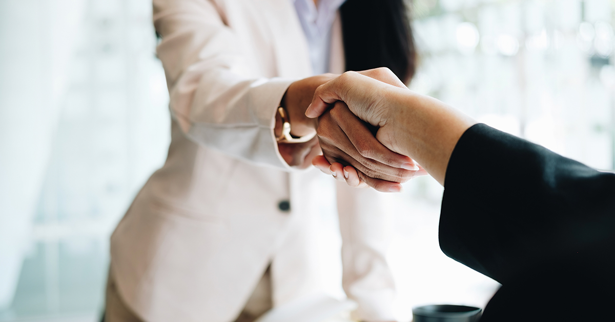 Two people shaking hands